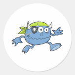 silly little blue pirate monster round sticker
