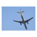 Single aeroplane on the blue sky background invites