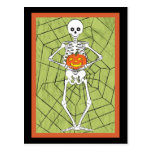 Skeleton holding a pumpkin post cards