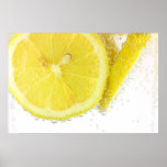 Sliced lemon in water posters