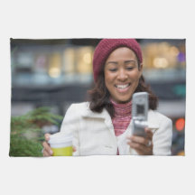 Smiling Business Woman with Cell Phone Towels