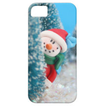 Snowman hiding or peeking from behind a tree iPhone 5 case