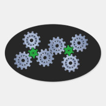 Some silver gears with a little green oval sticker