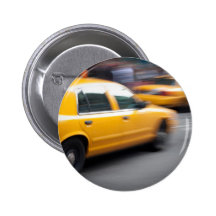 Speeding Yellow NY City Taxi Cab with Motion Blur Button