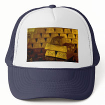 Stacks of gold bars trucker hat