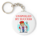 SUCCESS capitalist joke keychains