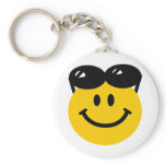 Sunglasses perched on top of head smiley face keychains