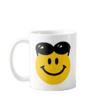 Sunglasses perched on top of head smiley face mugs