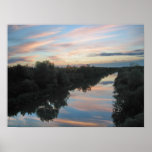 sunset clouds reflection on canal posters