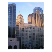 Sunset over tall buildings in San Francisco Postcard