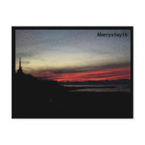 Sunset over the sea in Aberystwyth postcard