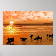 surfers walking on glorious sunset beach posters
