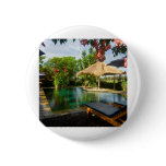 Swimming pool in a tropical resort pin