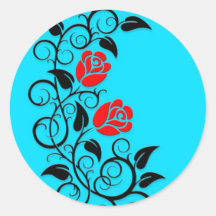 Swirling Red Roses, blue background Round Sticker
