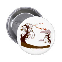 Swirly tree with flying birds graphic button