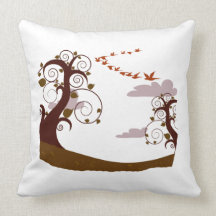 Swirly tree with flying birds graphic throw pillow