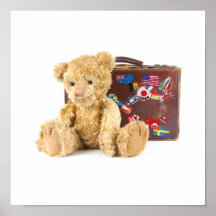 teddy bear and vintage old suitcase with world sti poster