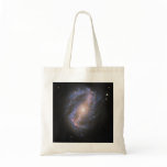 The Barred Spiral Galaxy NGC 6217 Tote Bags