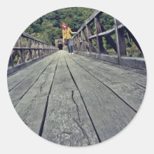 The girl on the bridge round stickers