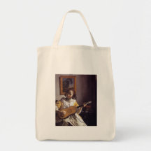 The Guitar Player Tote Bags