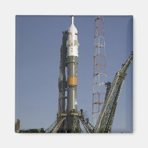 The Soyuz rocket is erected into position 2 Fridge Magnets
