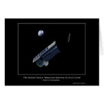 The Spitzer Space Telescope ejecting its dust cove cards