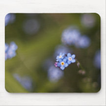 Tiny forget me not flower mouse pads