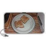 Toasted bread in a plate mini speakers