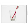 Toothbrush in a glass greeting cards