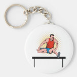 track and field athlete jumping hurdle keychain