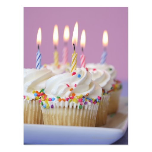 Tray of birthday cupcakes with candles post cards