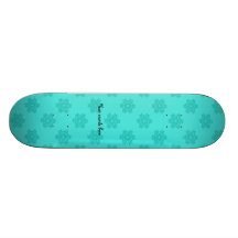 Turquoise snowflakes pattern skate board