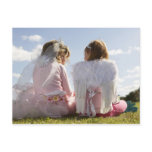 Two girls (7-9) dressed as angel and fairy postcards