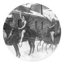 Two Girls in Bathing Suits on Horses in Winter
