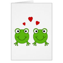 Two green frogs with red hearts. card