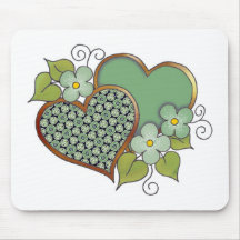 Two hearts with blossoms green mousepad