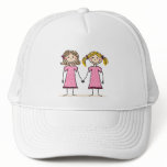 Two little girls holding hands hats