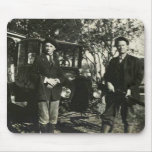 Two men with their guns in front of car mouse mat