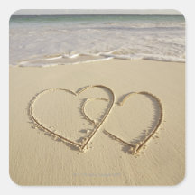 Two overlying hearts drawn on the beach square stickers