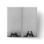 Two views of the construction of the Eiffel Pinback Button