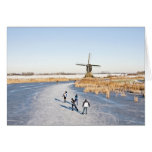 Typically dutch: ice skating on a frozen lake greeting cards