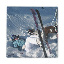 Upside down skiing refrigerator magnet