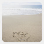 USA, Massachusetts, Hearts drawn on sandy beach 2 Square Sticker