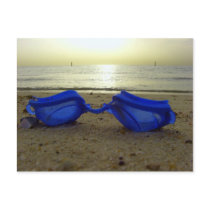 Vacation time, blue goggles at the beach