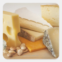 Various cheeses on chopping board stickers