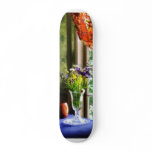 Vase of Flowers and Mug By Window skateboards