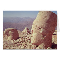 View of a colossal head and an eagle card