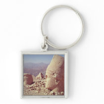 View of a colossal head and an eagle keychain