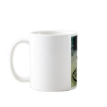 Vintage Baby in a walker Mugs