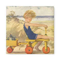 Vintage Boy Playing at the Beach with Toys